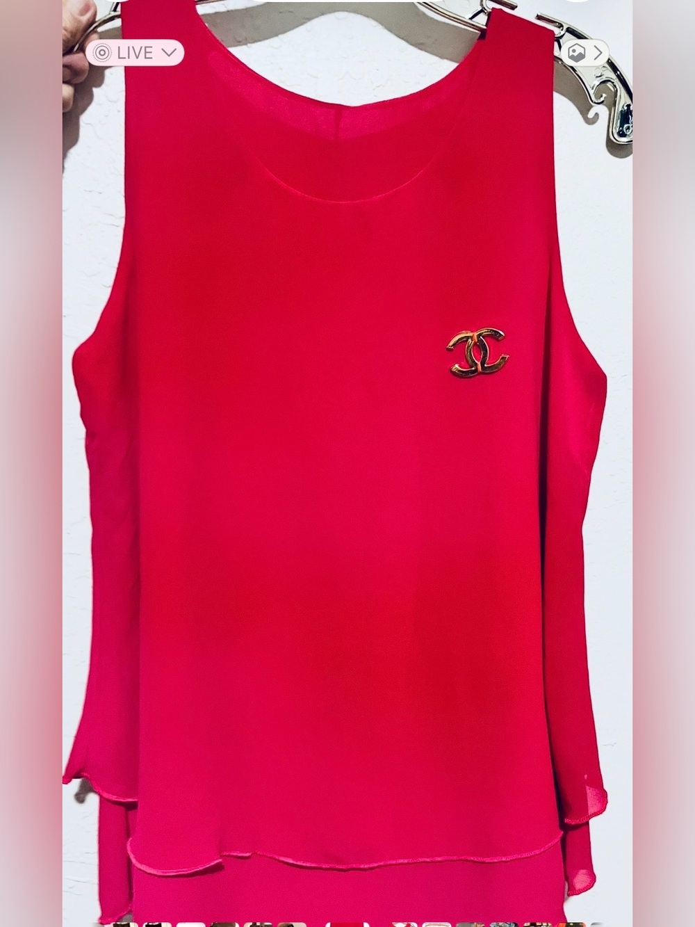 Fushia sleeveless blouse with gold accent and bow